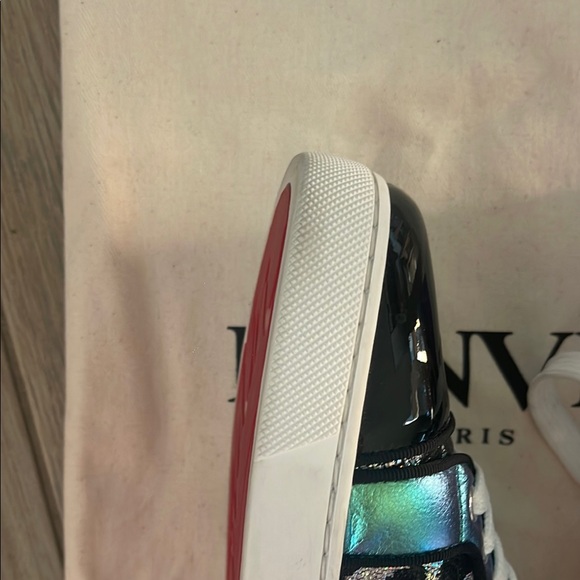 Black & Purple Women's Sneakers
made in Paris by Christian LOUBOUTIN
Red bottom - Picture 13 of 16